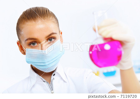 Young female scientist working in laboratory Young female scientist working in laboratory 7119720