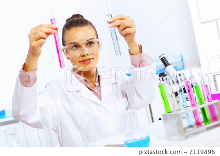 Young female scientist working in laboratory 7119896