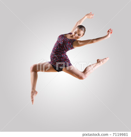 Girl in color dress dancing Girl in color dress dancing 7119981