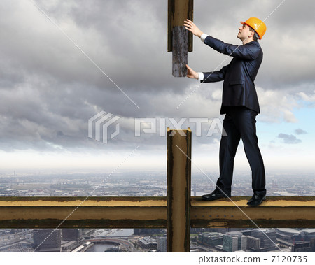Businessman standing on the construction site Businessman standing on the construction site 7120735