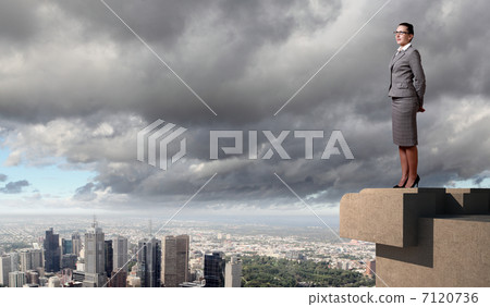Businesswoman and cityscape Businesswoman and cityscape 7120736
