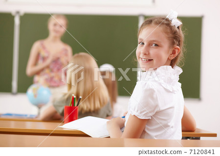 Little girl at school class Little girl at school class 7120841