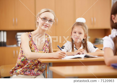 Teacher at school Teacher at school 7120963