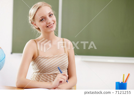 Teacher at school 7121255