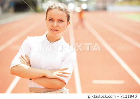 Business woman sport manager at athletic stadium Business woman sport manager at athletic stadium 7121940