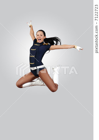 Young female dancer against white background 7122723