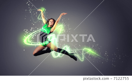 Young woman dancer. With lights effect. 7122755