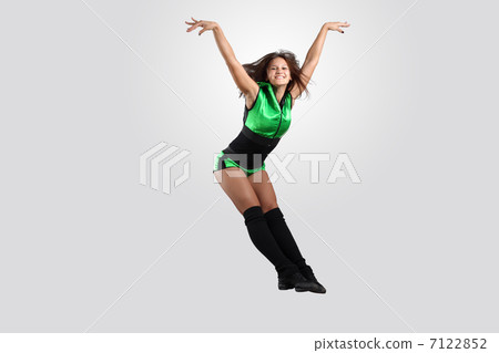 Young female dancer against white background 7122852