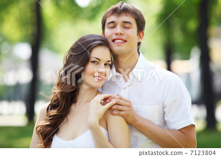 Young love Couple smiling under blue sky 7123804