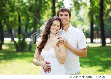 Young love Couple smiling under blue sky Young love Couple smiling under blue sky 7123899