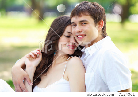 Young love Couple smiling under blue sky Young love Couple smiling under blue sky 7124061