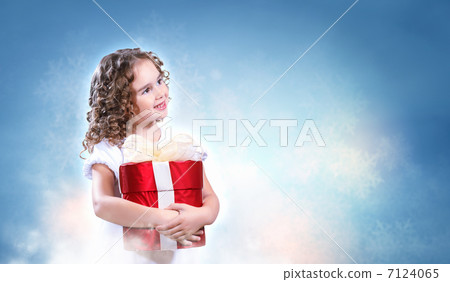 Happy girl opening gift box Happy girl opening gift box 7124065