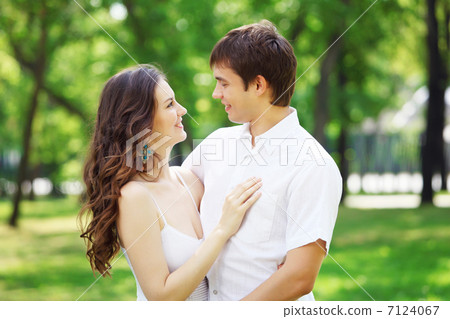 Young love Couple smiling under blue sky Young love Couple smiling under blue sky 7124067