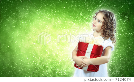 Happy girl opening gift box 7124074