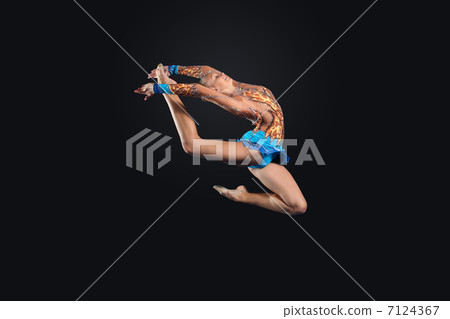 Young woman in gymnast suit posing Young woman in gymnast suit posing 7124367