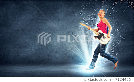 young woman playing on electro guitar and jumping young woman playing on electro guitar and jumping 7124435