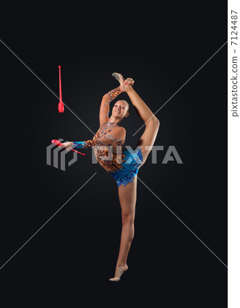 Young woman in gymnast suit posing Young woman in gymnast suit posing 7124487
