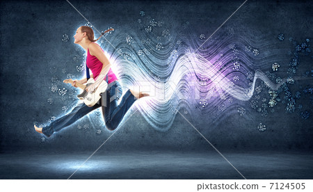 young woman playing on electro guitar and jumping young woman playing on electro guitar and jumping 7124505