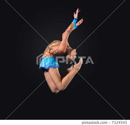 Young woman in gymnast suit posing Young woman in gymnast suit posing 7124543