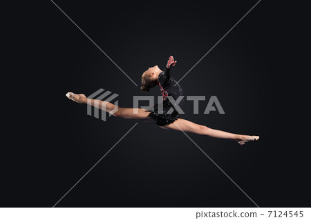 Young woman in gymnast suit posing 7124545