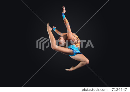 Young woman in gymnast suit posing 7124547