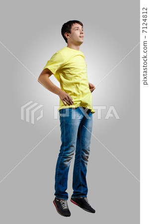 Young man dancing and jumping Young man dancing and jumping 7124812