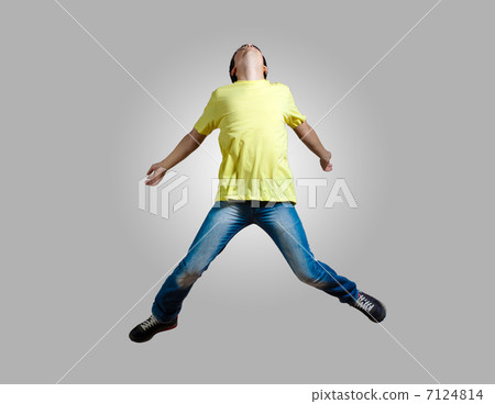 Young man dancing and jumping Young man dancing and jumping 7124814