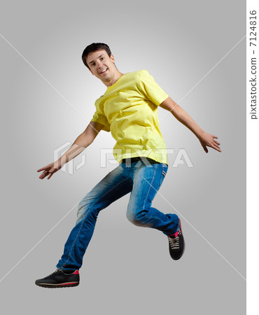 Young man dancing and jumping Young man dancing and jumping 7124816