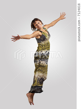 young woman dancing and jumping young woman dancing and jumping 7124818