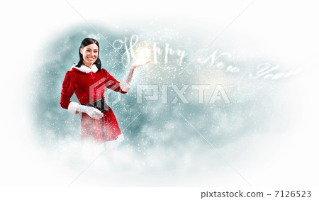 Portrait of girl wearing santa claus clothes Portrait of girl wearing santa claus clothes 7126523