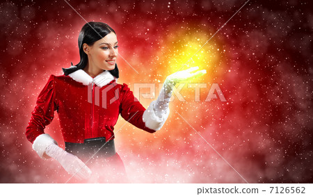 Portrait of girl wearing santa claus clothes Portrait of girl wearing santa claus clothes 7126562