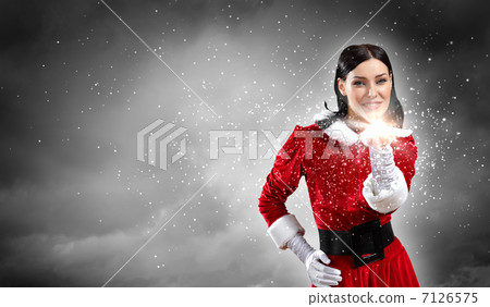 Portrait of girl wearing santa claus clothes 7126575