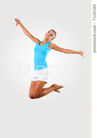 fitness woman jumping excited fitness woman jumping excited 7126589