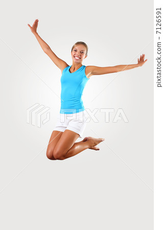 fitness woman jumping excited fitness woman jumping excited 7126591