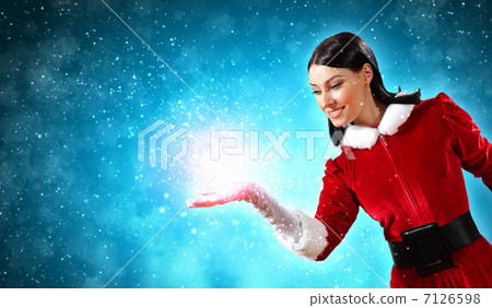 Portrait of girl wearing santa claus clothes 7126598