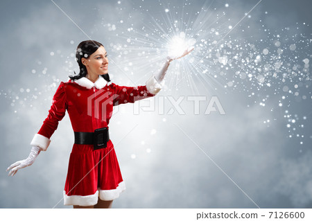 Portrait of girl wearing santa claus clothes 7126600