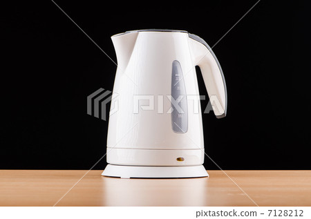 White kettle against grey background White kettle against grey background 7128212