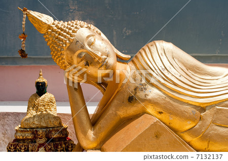 Golden statue of resting Buddha (Tuesday) in Wat Phra Yai Temple 7132137