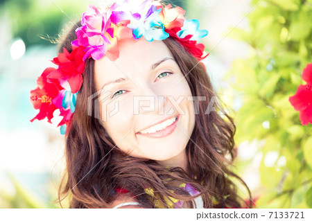 Happy woman enjoying sun on the beach 7133721