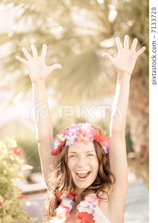 Happy woman enjoying sun on the beach 7133728