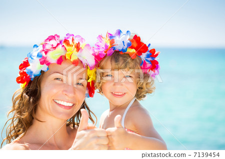 Woman and child showing thumb up Woman and child showing thumb up 7139454