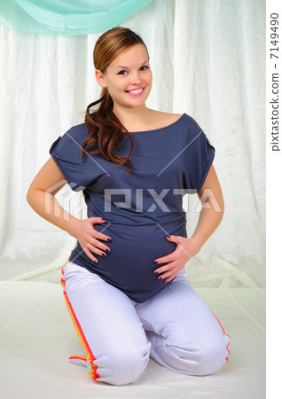 Portrait of a young pregnant girl 7149490