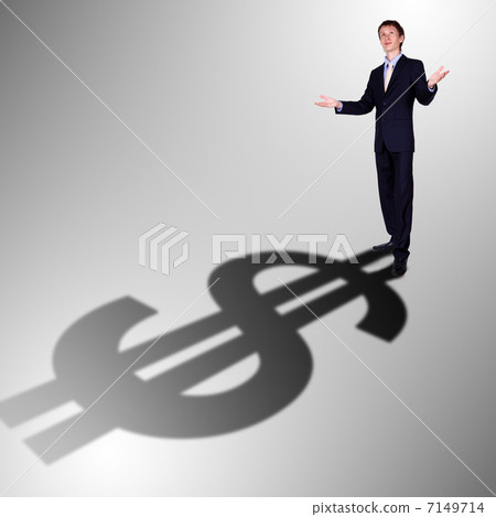 Businessman with shadow as a currency symbol Businessman with shadow as a currency symbol 7149714