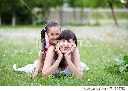 Young mother and her young daughter Young mother and her young daughter 7149760