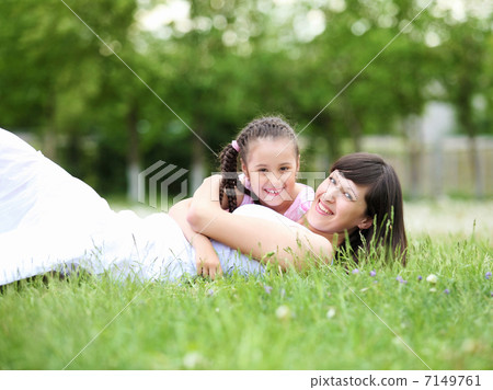 Young mother and her young daughter Young mother and her young daughter 7149761
