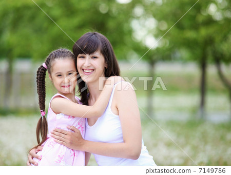 Young mother and her young daughter 7149786