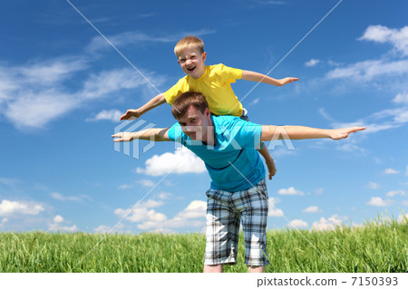 father with son in summer day outdoors father with son in summer day outdoors 7150393