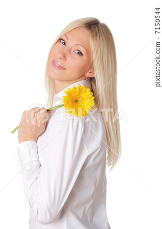 Young smiling blonde in a white shirt Young smiling blonde in a white shirt 7150544
