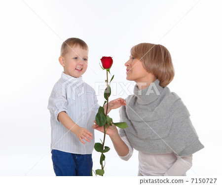 mother and son holding a red rose mother and son holding a red rose 7150727
