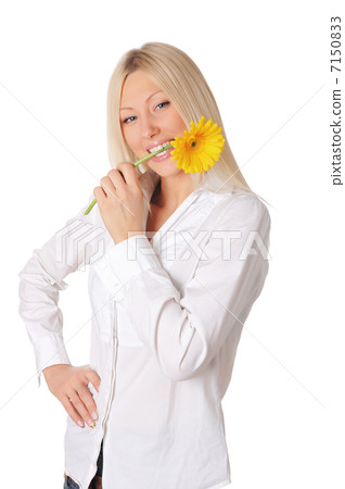 Young smiling blonde in a white shirt Young smiling blonde in a white shirt 7150833